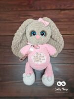 Brown bunny in pink pijama