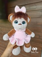 Brown moBright-eyed cute Miss Monkey named toynkey with sparkle eyes