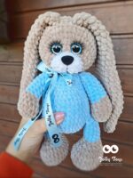 Brown bunny with blue pijama