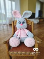 Bunny with mismatched ears in a pink sweater. Personalized newborn gift